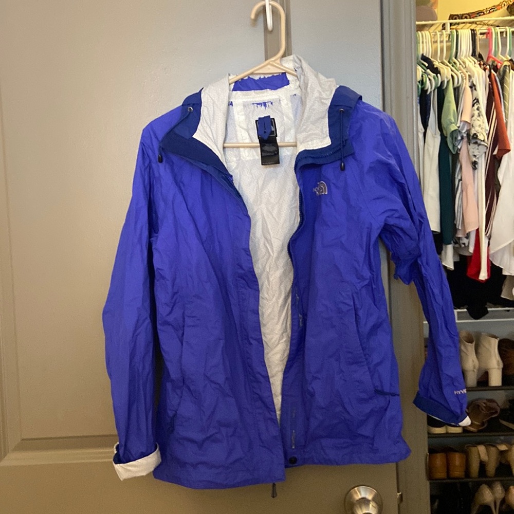 Well loved north face rain jacket
